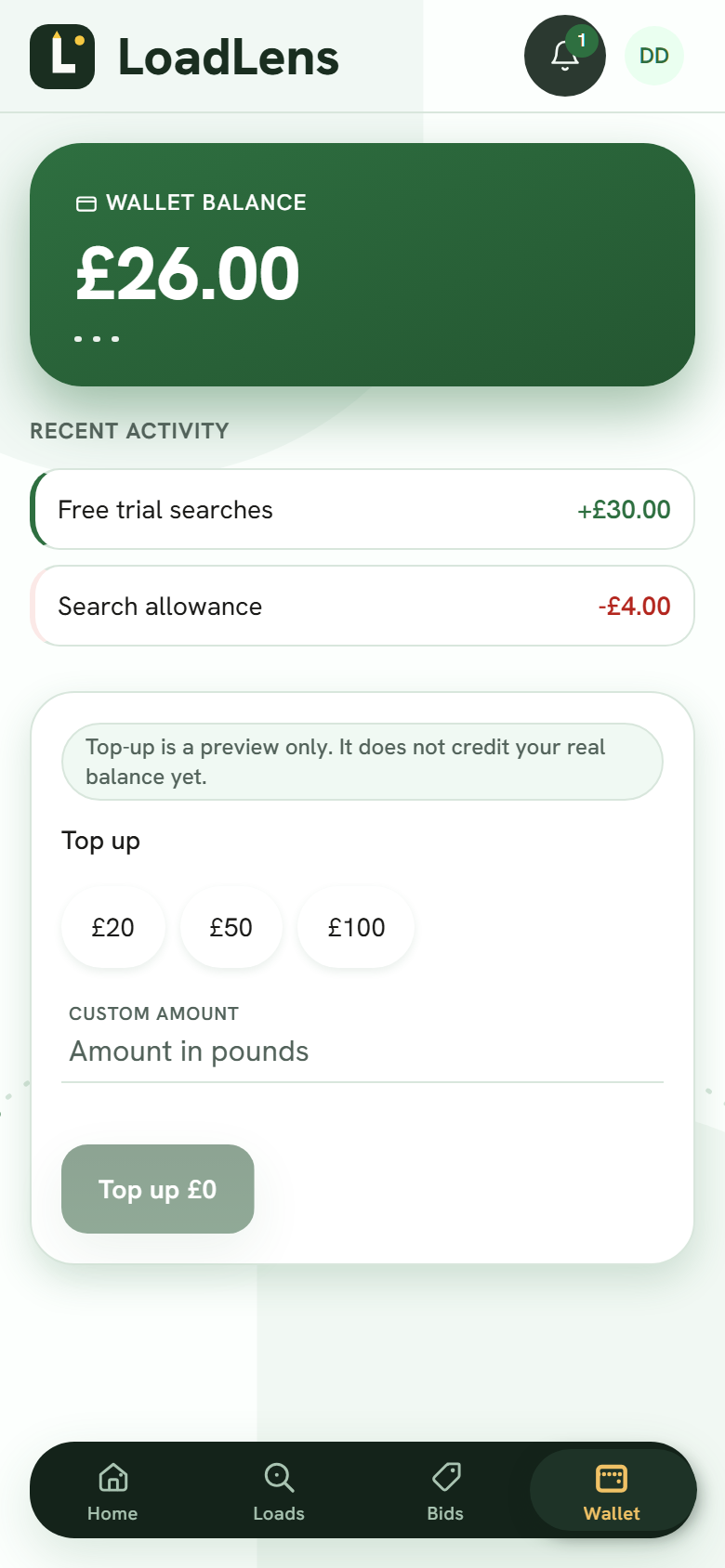 The wallet screen in the LoadLens app: trial balance, recent activity and an honest top-up preview.